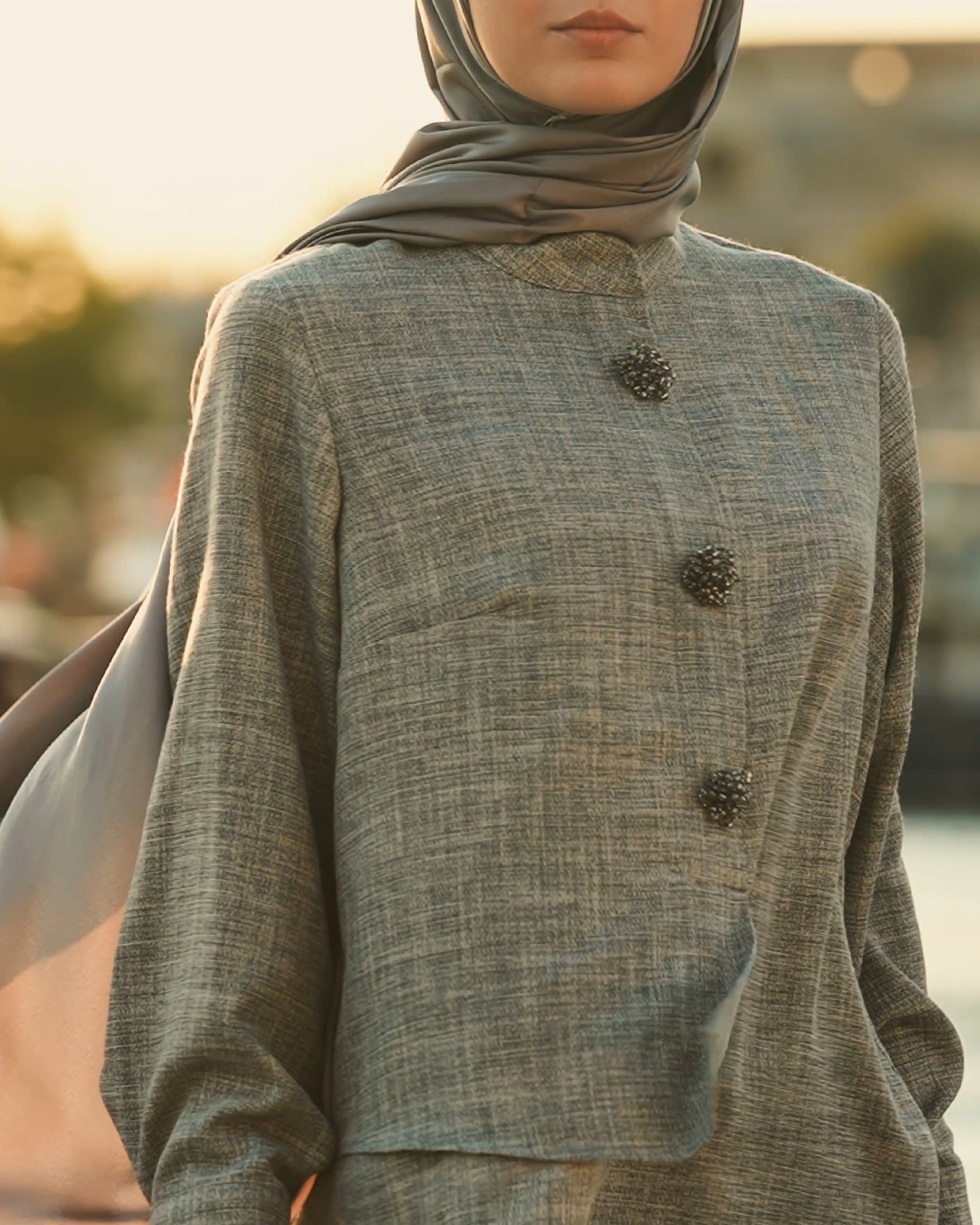 Brooch Accent Tunic In Dusky Sea