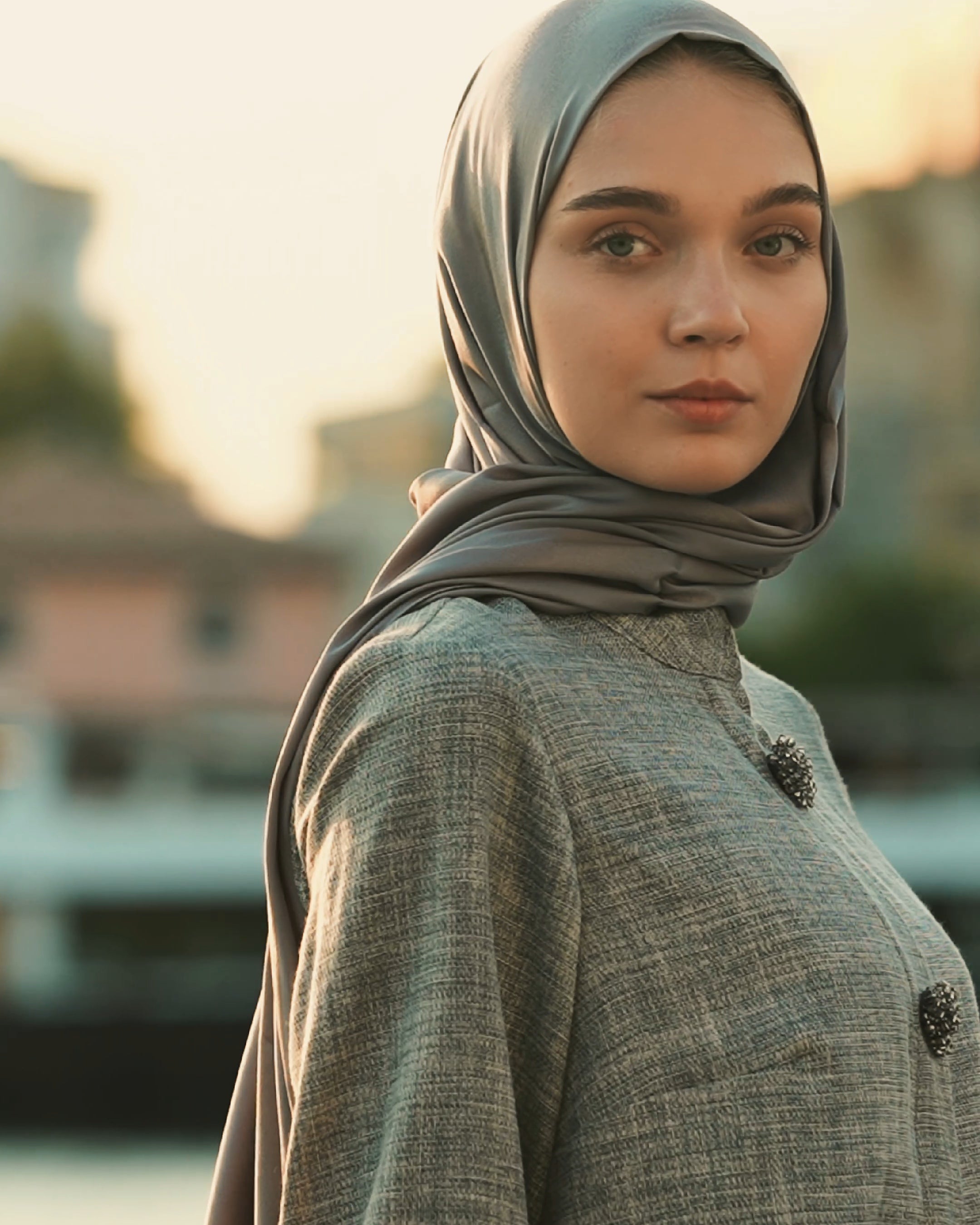 Brooch Accent Tunic In Dusky Sea