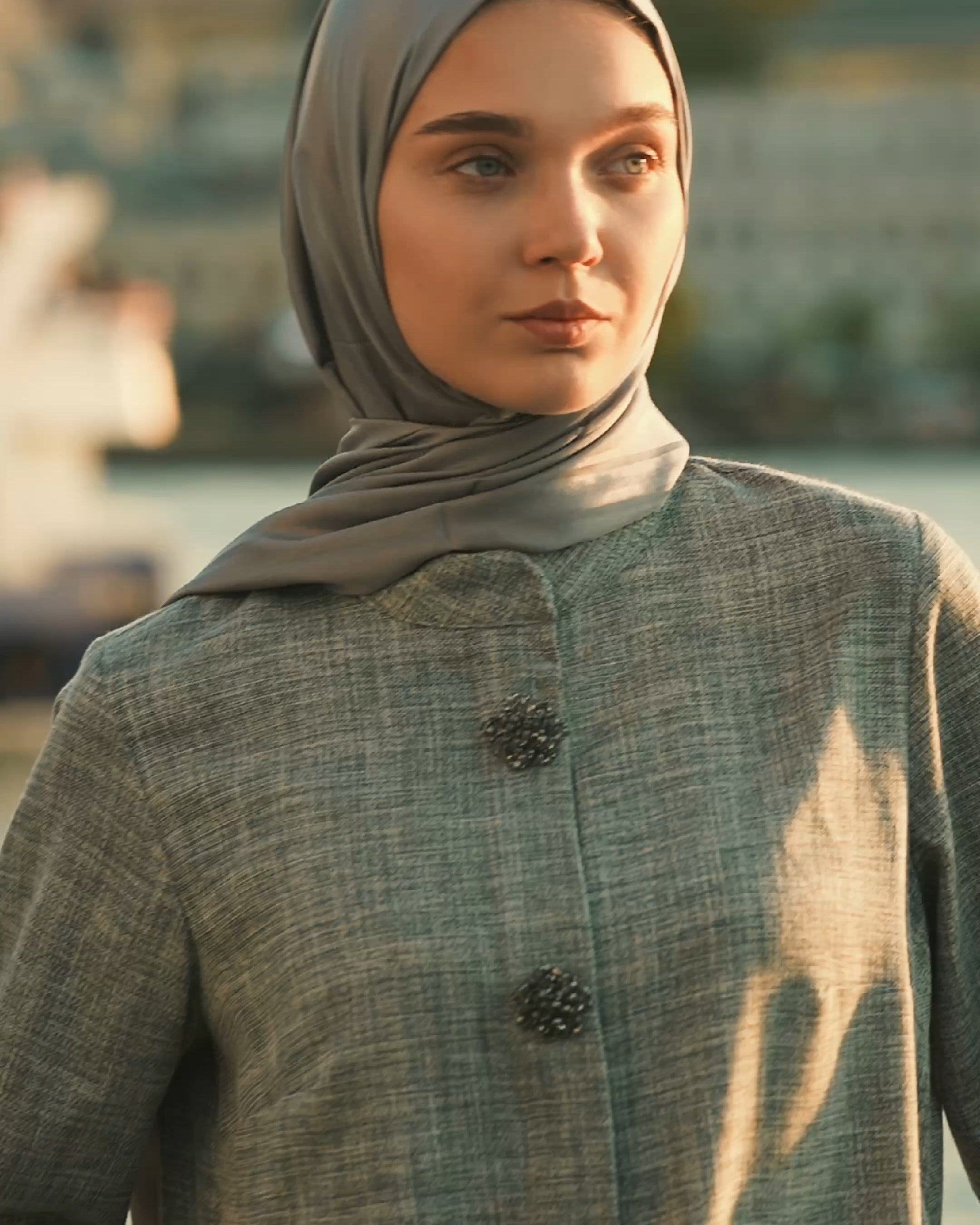 Brooch Accent Tunic In Dusky Sea