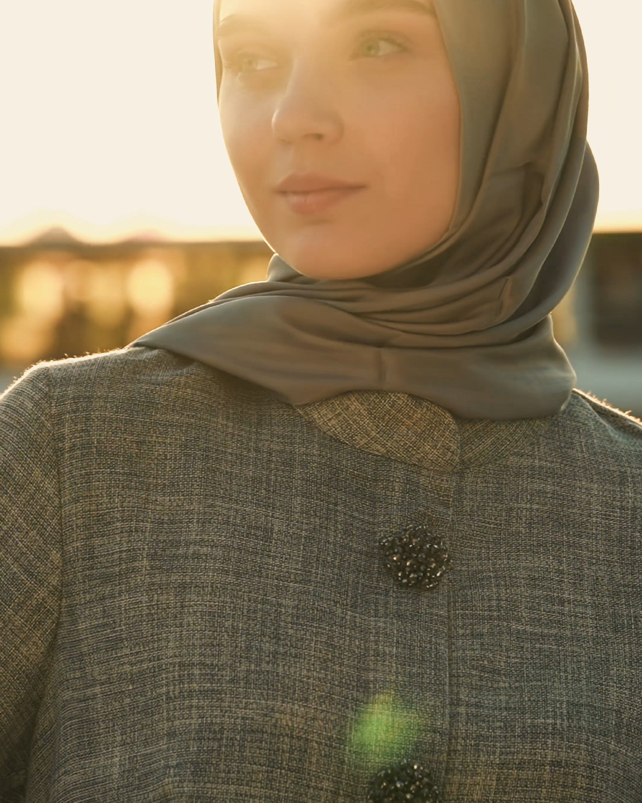 Brooch Accent Tunic In Dusky Sea