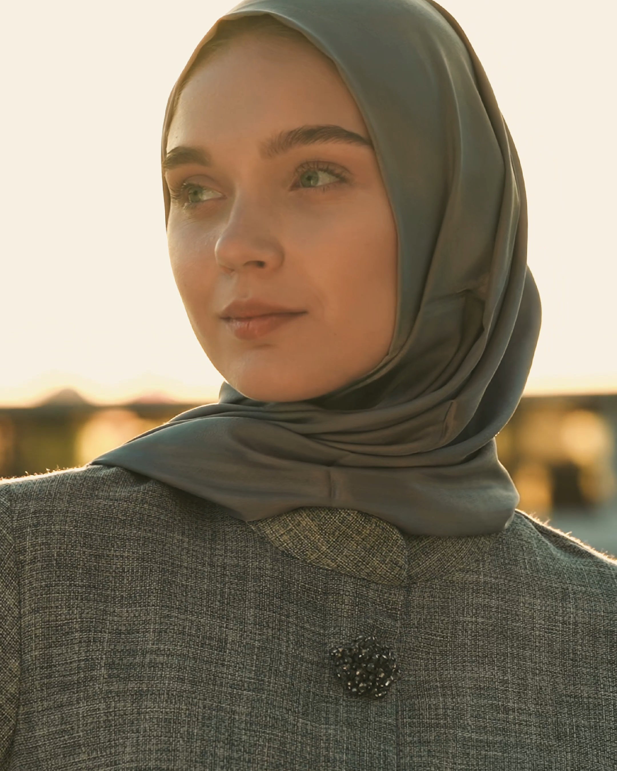 Brooch Accent Tunic In Dusky Sea