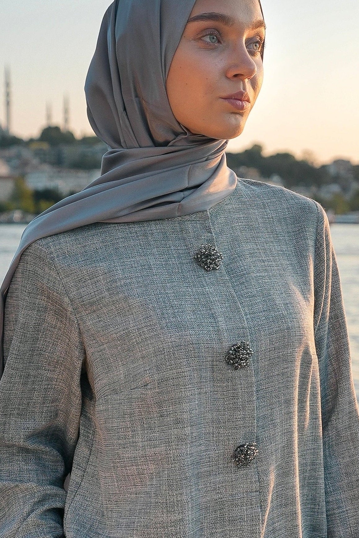 Brooch Accent Tunic In Dusky Sea
