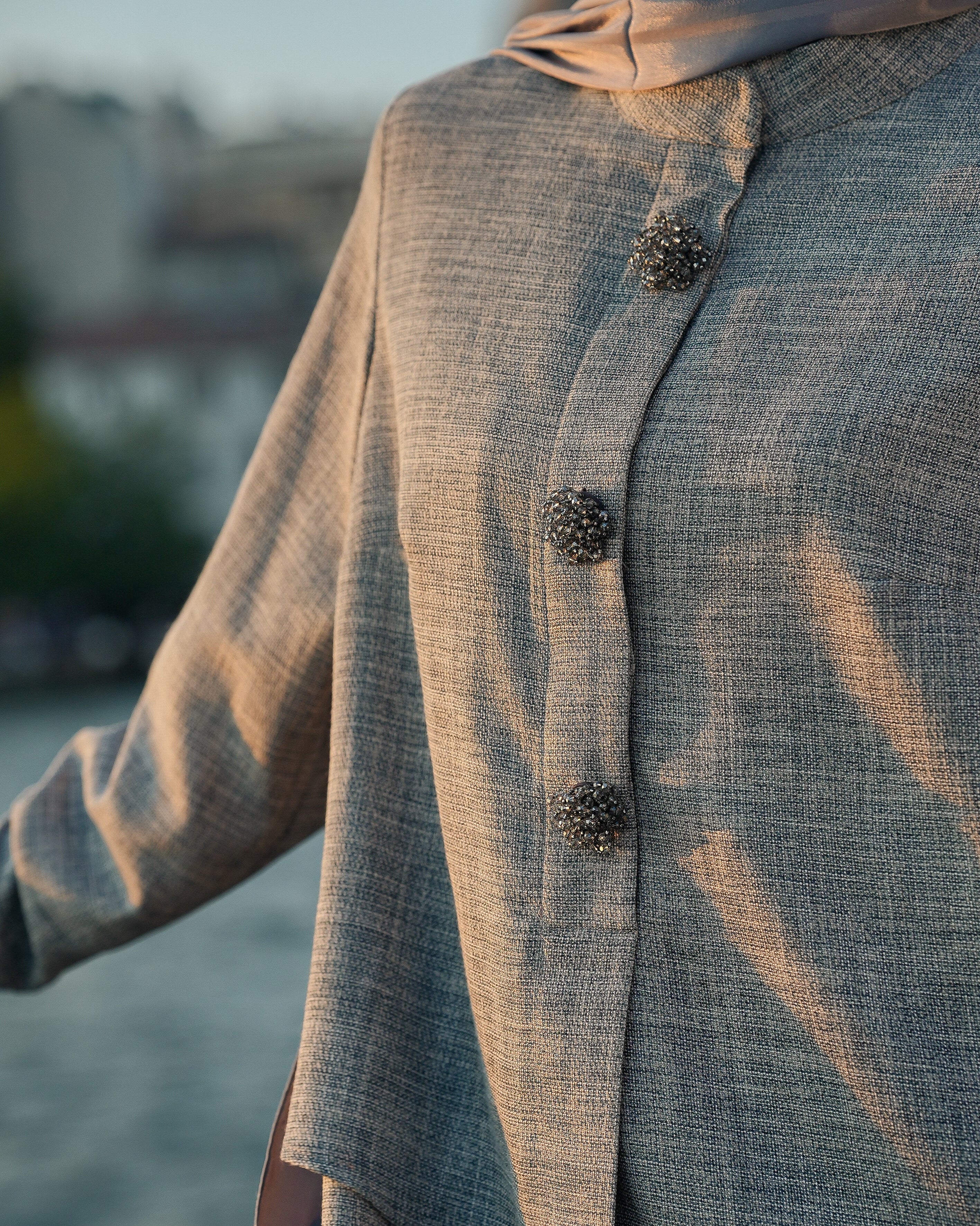 Brooch Accent Tunic In Dusky Sea