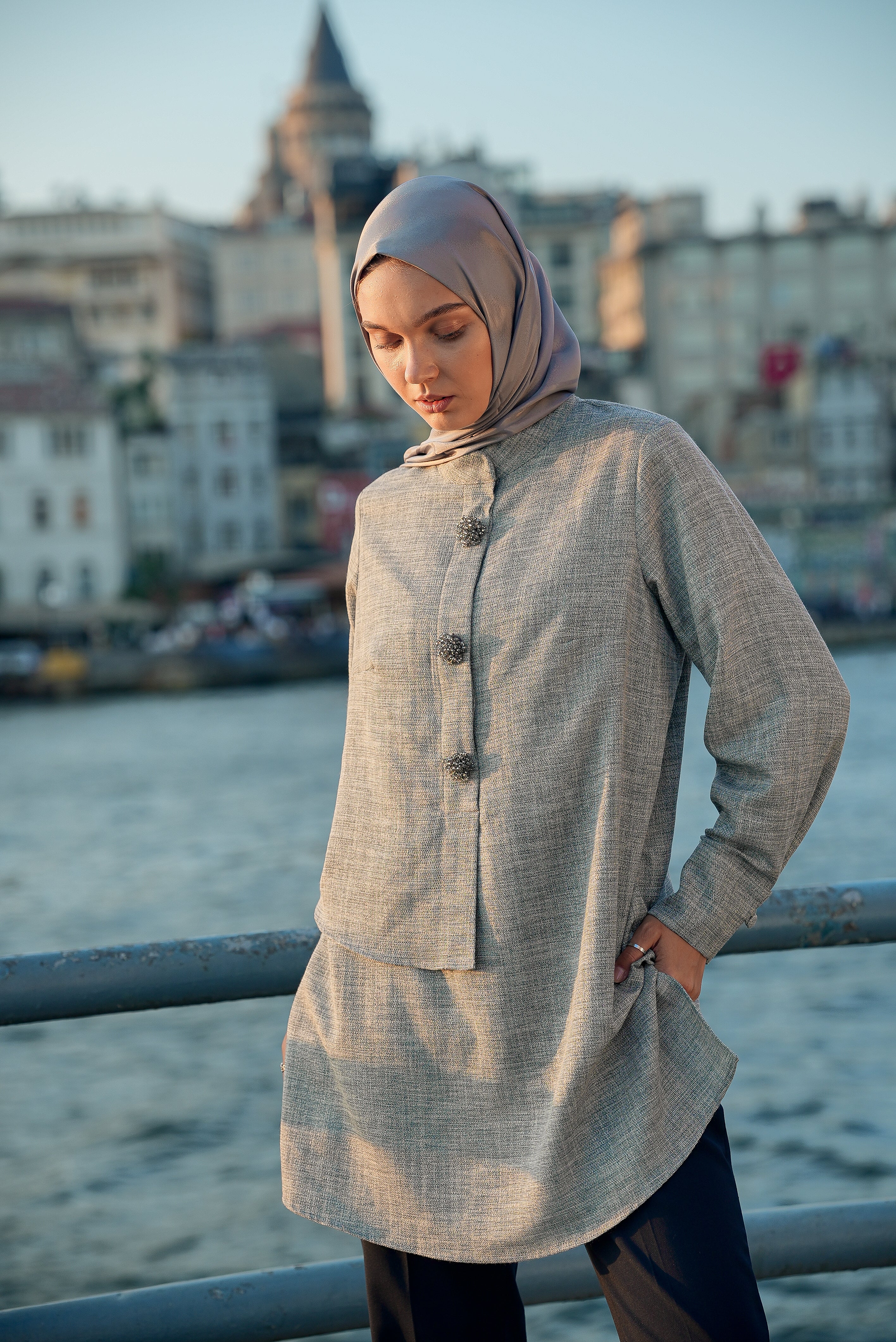 Brooch Accent Tunic In Dusky Sea