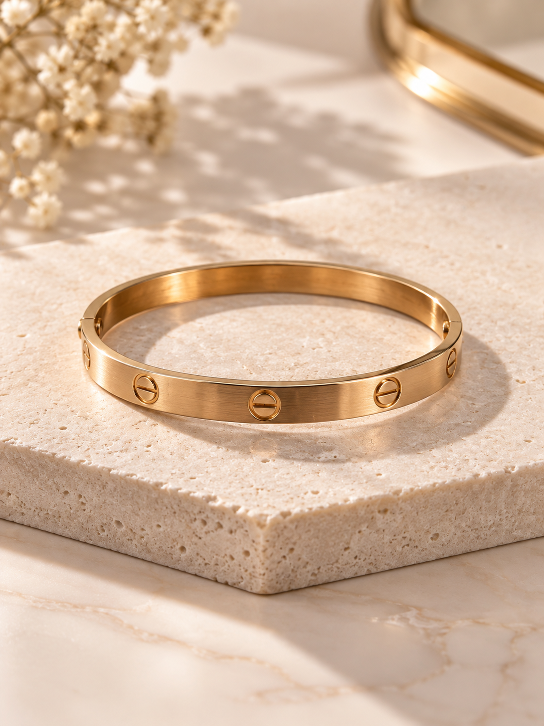 The Signature Rivet Silhouette Bangle