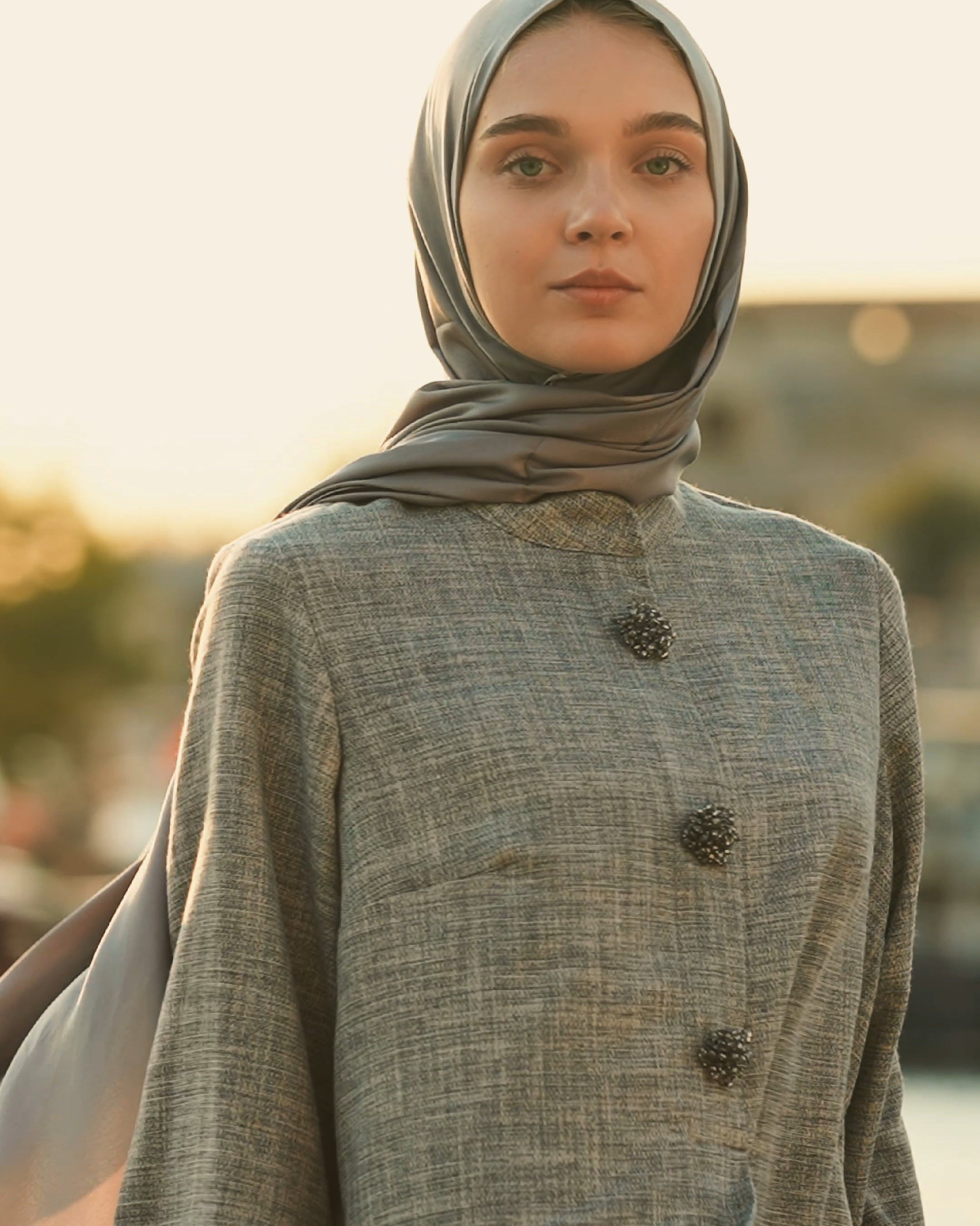 Brooch Accent Tunic In Dusky Sea