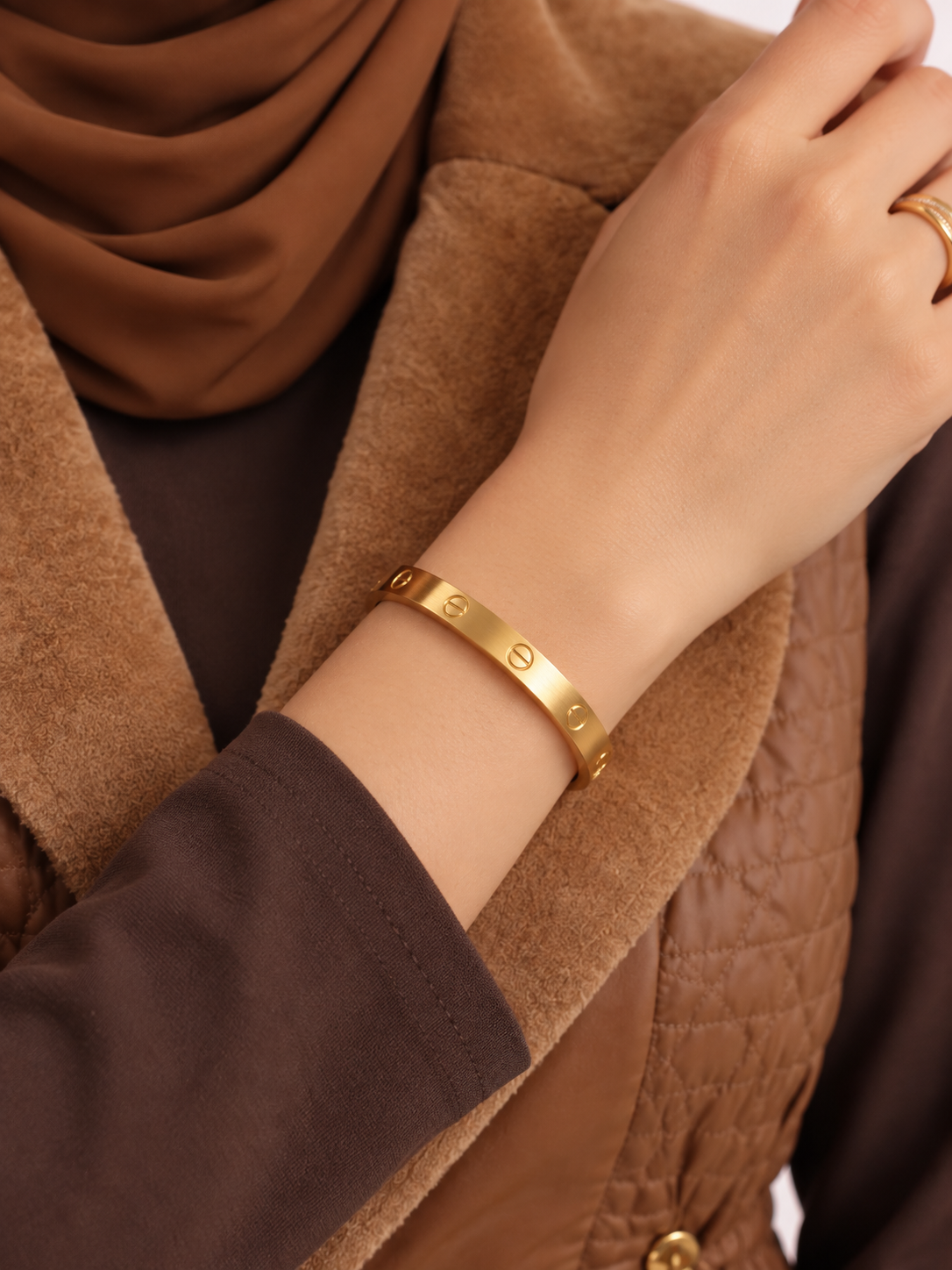 The Signature Rivet Silhouette Bangle